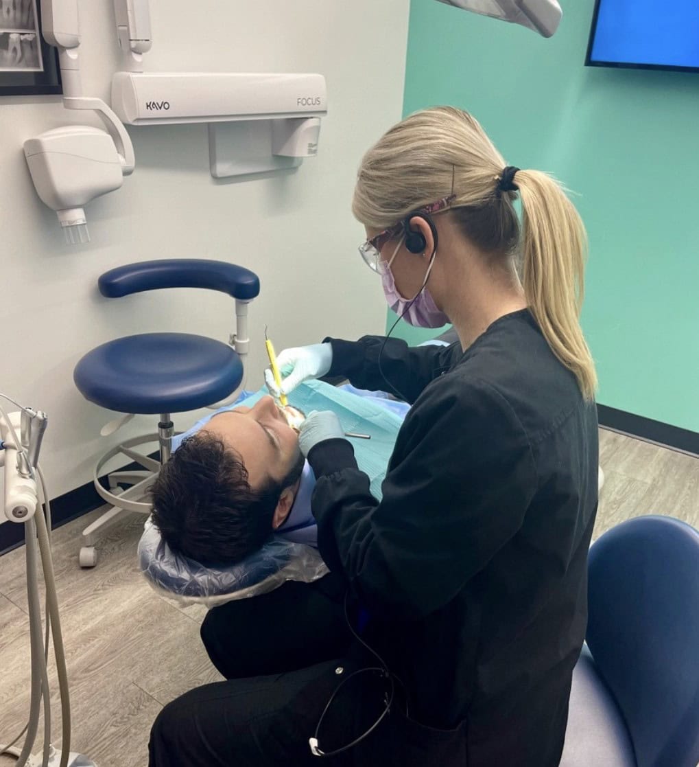 hygienist with patient