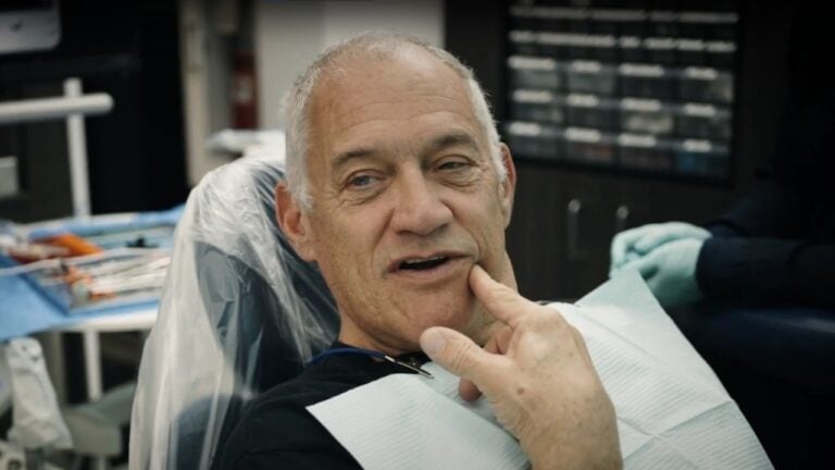 patient pointing to mouth